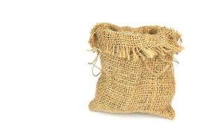 sac de jute sur fond blanc photo