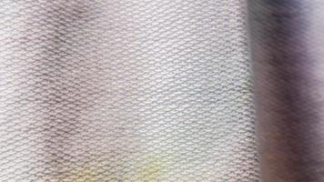 texture de tissu blanc avec des motifs jaunes et bleus en arrière-plan photo