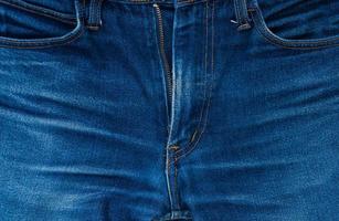 jeans denim bleu homme, arrière-plan avant zip ouvert, couleur vintage du jean denim vintage photo