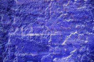 bleu vaporisateur La peinture sur stuc mur texture Contexte. photo