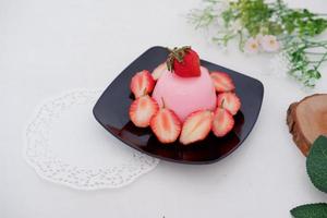 pudding avec délicieux des fraises comme une Contexte photo