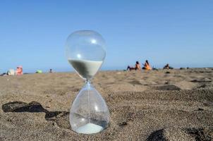 Sablier sur le le sable photo