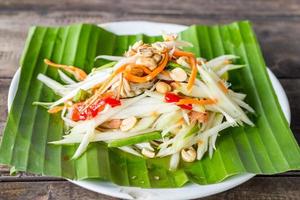 Papaye salade et thaïlandais nourriture photo