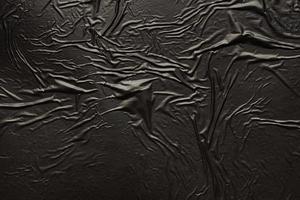 fond de texture de sac en plastique froissé et froissé noir photo