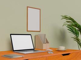 maquette affiche et ordinateur portable sur le bureau photo