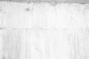 texture de mur en stuc grunge blanc pour le fond. photo