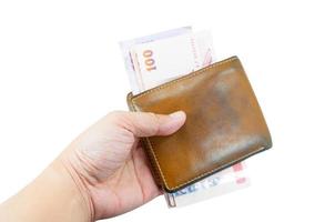 main Hommes tenir portefeuille argent sur blanc Contexte , Thaïlande billets de banque photo