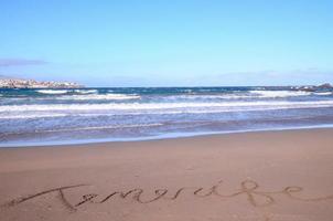 l'écriture dans le le sable photo