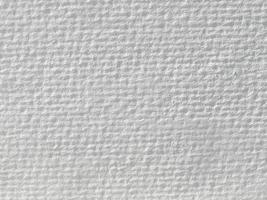 blanc aquarelle papier ou mur, ondulé rugueux texture modèle, abstrait arrière-plan, fond d'écran, brosse accident vasculaire cérébral graphique, art papier, éclaboussures, copie espace pour texte, horizontal photo