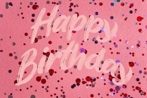 content anniversaire texte sur rose confettis Contexte photo