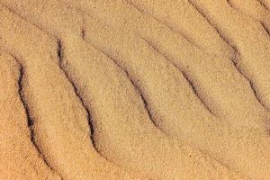 vagues dans le le sable photo