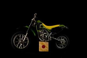 jouet moto sur noir Contexte photo