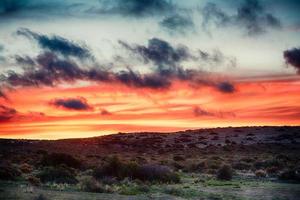 fond de coucher de soleil rouge en patagonie photo