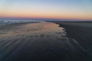 lever du soleil sur la plage de l'océan pacifique au mexique baja california sur photo