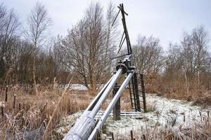 vieux tjasker, un vieux petit Moulin à vent de frise, le Pays-Bas. photo