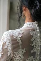 portrait de une fille dans une mariage robe fermer photo