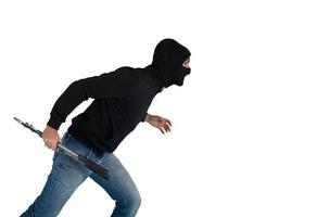 voleur avec cagoule actes dans silence à voler appartements avec câble coupeurs dans main photo