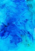 aquarelle liquide bleu et turquoise Contexte La peinture texture. taches sur papier. photo