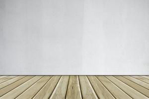 mur de béton blanc et plancher en bois photo