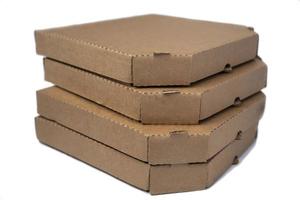 empiler plat marron papier carton Pizza des boites isolé sur une blanc Contexte photo