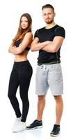 athlétique homme et femme après aptitude exercice sur le blanc photo