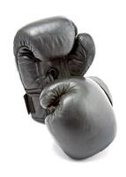 gants de boxe sur blanc Contexte photo