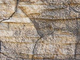 mur de roche ou de pierre pour le fond ou la texture photo