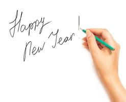 femme main en portant une crayon et l'écriture content Nouveau année sur une blanc blanc photo