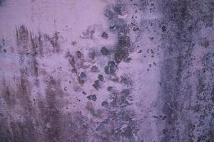 le texture de un vieux rustique mur est couvert avec rose stucrésumé Contexte pour conception photo