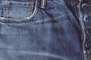 proche en haut de vieux denim jeans pantalon photo