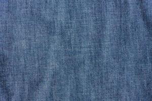 fermer de chambray jeans textile, tissu Contexte photo