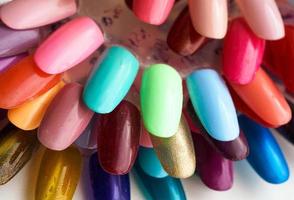 Contexte de différent coloré ongles polonais palette photo