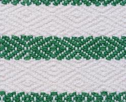 pièce de coton en tissu pour fabrication nappes et cuisine les serviettes avec vert brodé éléments photo