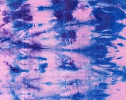 attacher colorant. en tissu hippie conception. batik.textile shiboritie colorant. en tissu hippie conception. indigo imprimer. coton en tissu abstrait texture psychédélique Contexte. photo