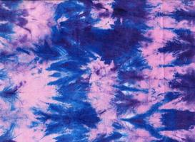 attacher colorant. en tissu hippie conception. batik.textile shiboritie colorant. en tissu hippie conception. indigo imprimer. coton en tissu abstrait texture psychédélique Contexte. photo