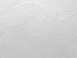texture transparente du mur de ciment blanc une surface rugueuse, avec un espace pour le texte, pour un arrière-plan. photo