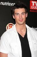 Adam Grégoire en arrivant à le la télé guider magazine le plus sexy étoiles fête à le le coucher du soleil tours Hôtel dans Ouest Hollywood Californie en mars 24 20092009 photo