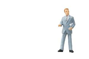 homme d & # 39; affaires miniature sur fond blanc photo