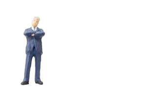 homme d & # 39; affaires miniature sur fond blanc photo