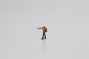 une proche en haut de une miniature figure de une photographe photo