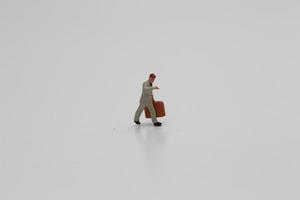 une proche en haut de une miniature figure de un Bureau ouvrier photo