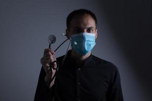 homme dans une protecteur masque, le h1n1 virus photo