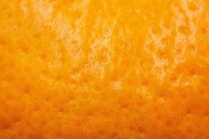 peau des oranges mandarin . texture proche en haut. photo