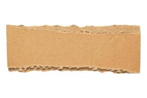 Morceau de papier carton brun isolé sur fond blanc photo