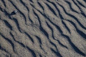 vagues dans le le sable photo