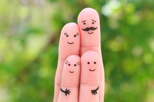 art des doigts de famille heureuse. concept parents et enfants ensemble. photo