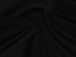 abstrait de forme de beauté. tissu doux textile courbe lisse noire matrice de mode décorer fond de charbon de bois photo