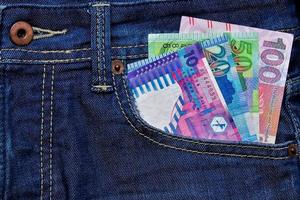 Hong kong dollar devise dans jeans poche photo