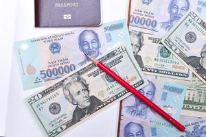 vietnam et nous dollar monnaie, carnet et passeport photo