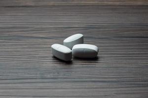 médicament pilule tablette, en bois Contexte photo